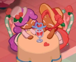 An image of two NPCs from Cookie Run: Kingdom sharing a drink.